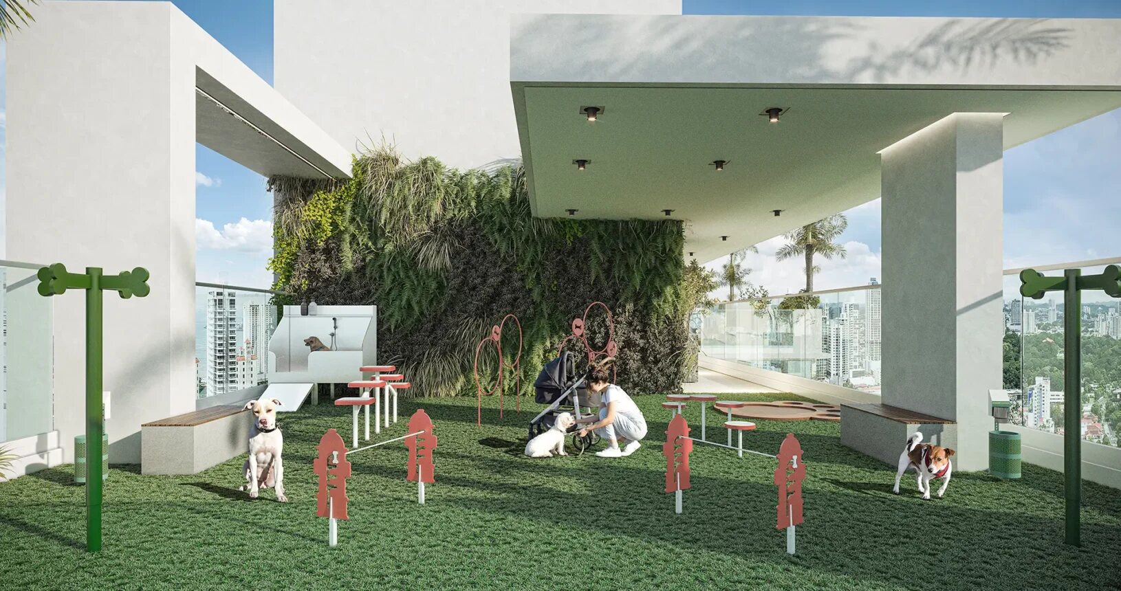Área social al aire libre con perros y una persona, junto a muros verdes y vista urbana.